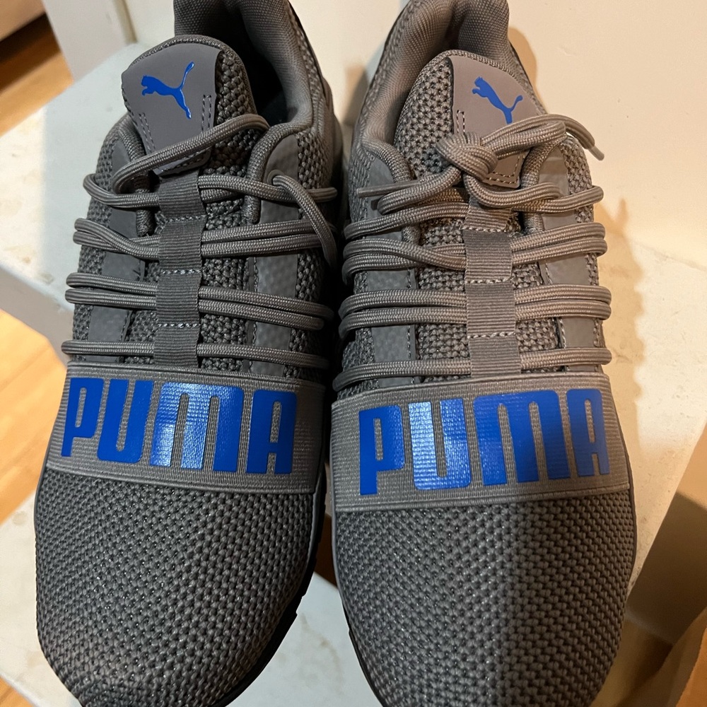 Never been worn,Puma Men’s running shoes, size 8.5